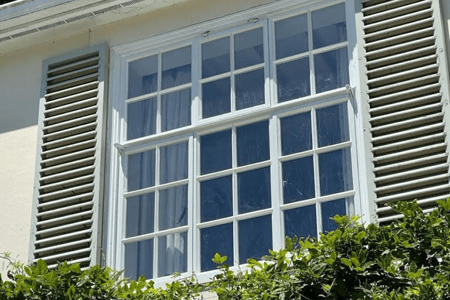Steel windows with shutters