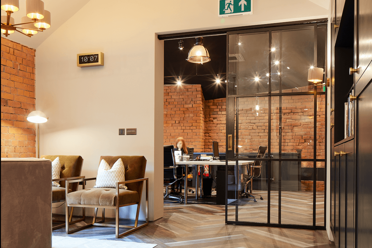 Office using innervision sliding doors to open the space