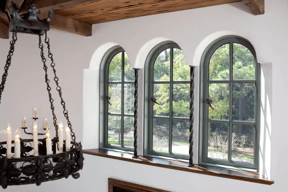 Green trio of arched windows