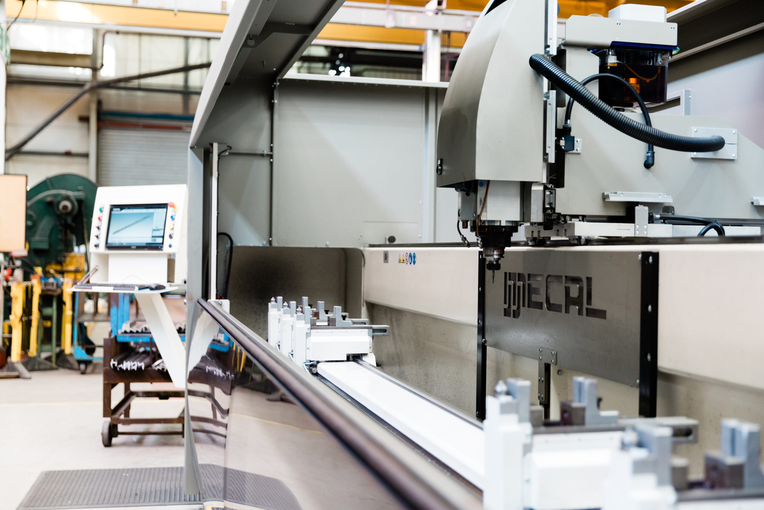 Machine in Crittall factory creating steel profiles